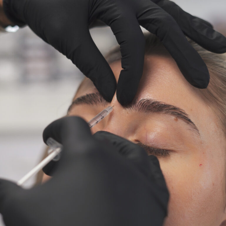 Provider performing PDO threads treatment at Prime MD Aesthetics & Wellness to lift and tighten facial skin