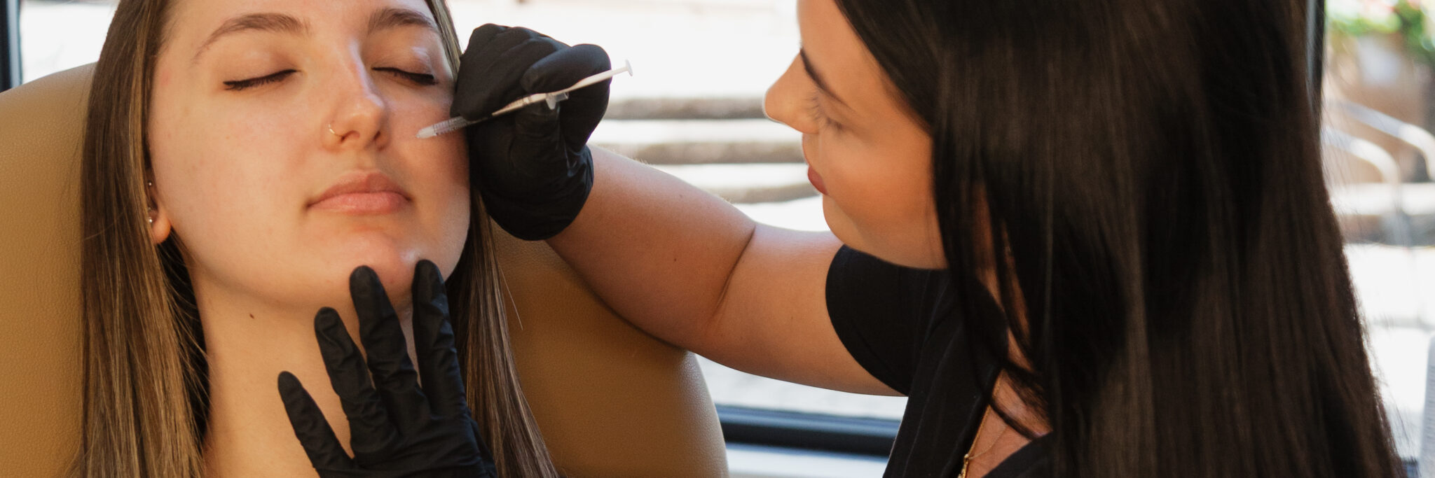 Provider administering biostimulator injection at Prime MD Aesthetics & Wellness to restore volume and stimulate collagen production