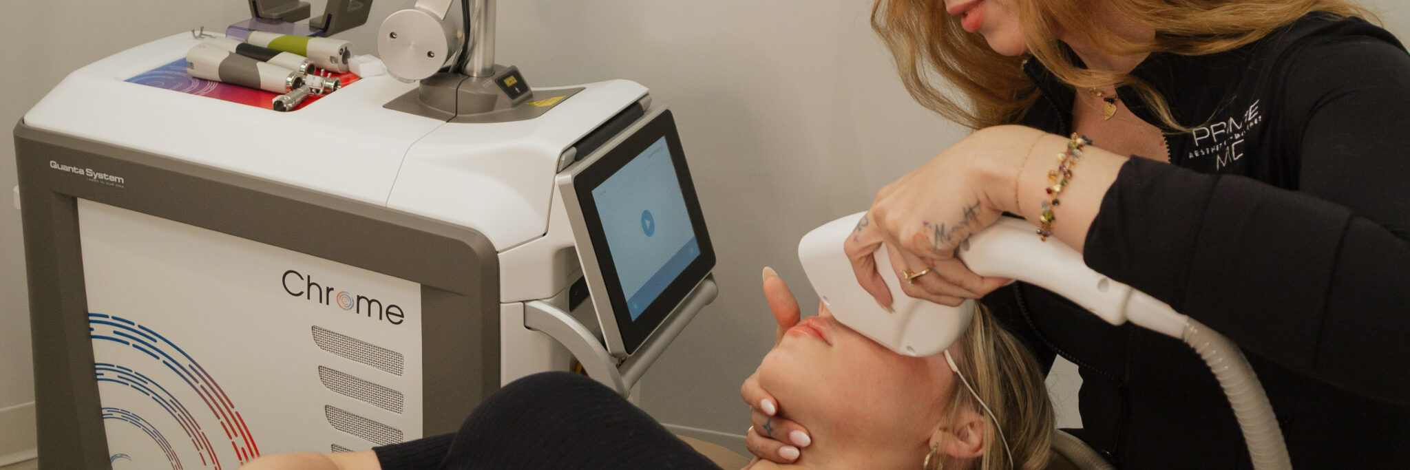 Provider performing IPL therapy at Prime MD Aesthetics & Wellness to treat sun damage, redness, and uneven skin tone