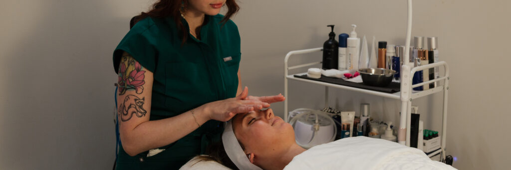 Aesthetic provider applying a chemical peel treatment at Prime MD Aesthetics & Wellness to exfoliate and rejuvenate skin.